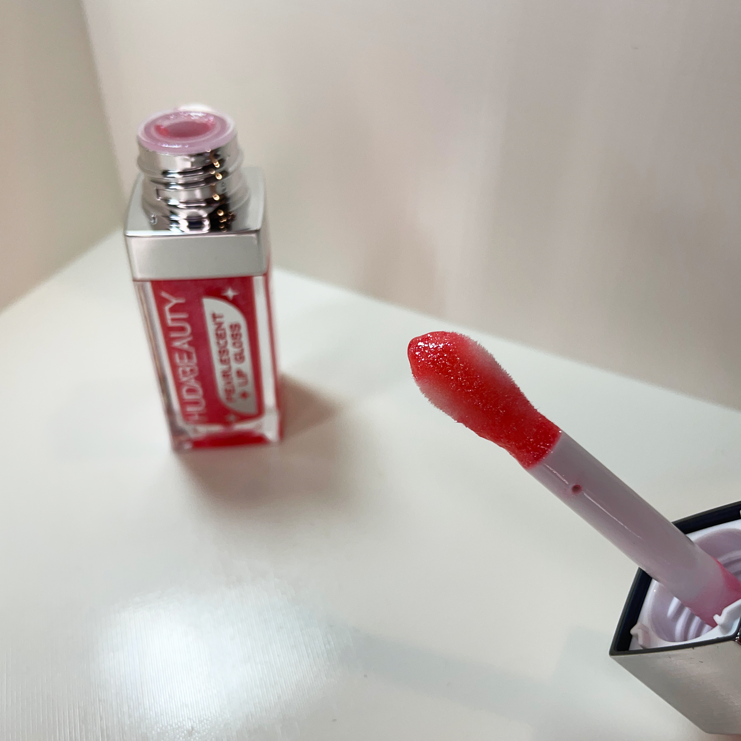 Huda Beauty Brillo de Labios Perlado
